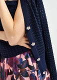 Dark blue knitted v-neck cardigan with rhinestone-embellished buttons