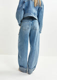 Blue balloon-fit jeans with folded cuffs and detachable chain