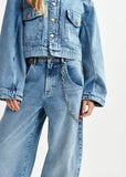 Blue balloon-fit jeans with folded cuffs and detachable chain